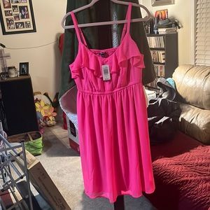 Bright Pink Torrid adjustable strap dress. Has a lining inside. Elastic waist.